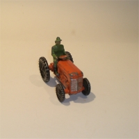 A small diecast tractor
