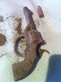 A Pope Product diecast toy gun